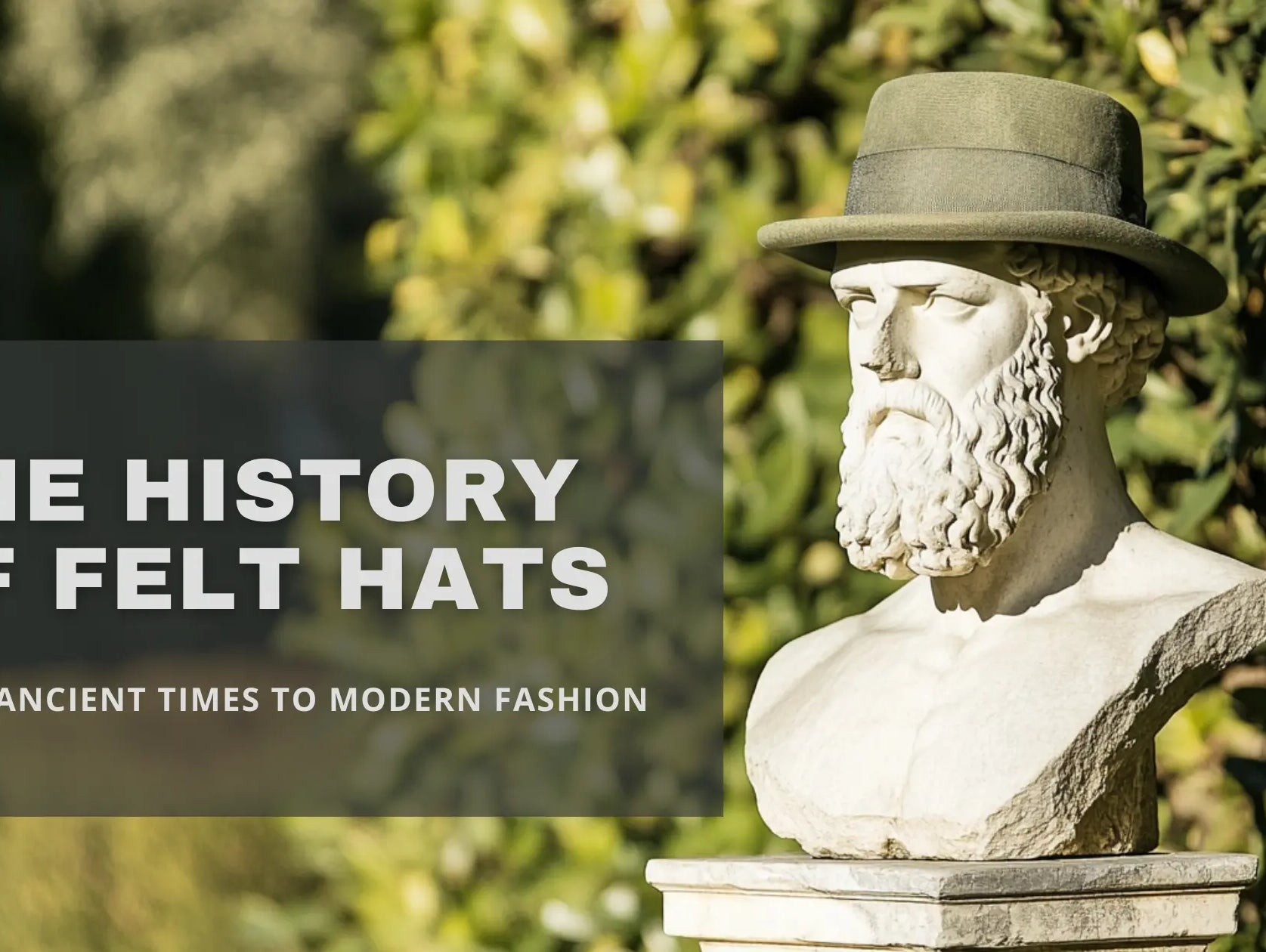Statue of a classical figure wearing a felt hat with text overlay 'The History of Felt Hats - From Ancient Times to Modern Fashion' against a lush green background.