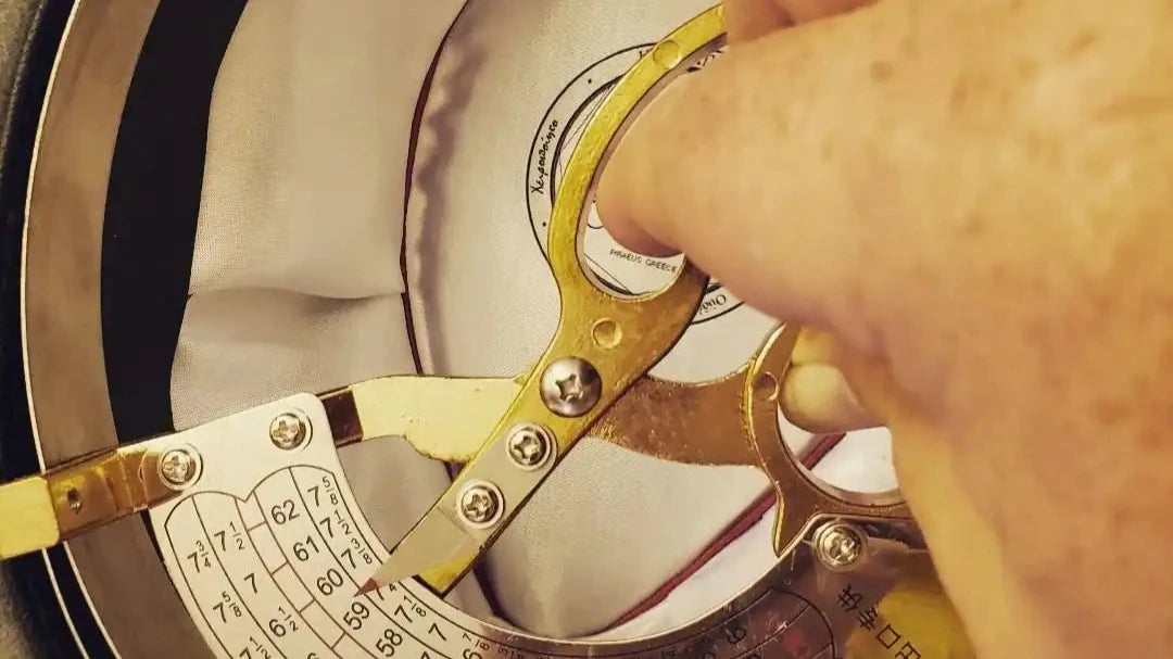 Image of a measuring ring used to gauge the inside circumference of an Agnoulita Hat, an integral part of our quality control process.