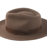 The Pathfinder: Side angle showcasing the syrup hatband on taupe felt | Agnoulita Hats