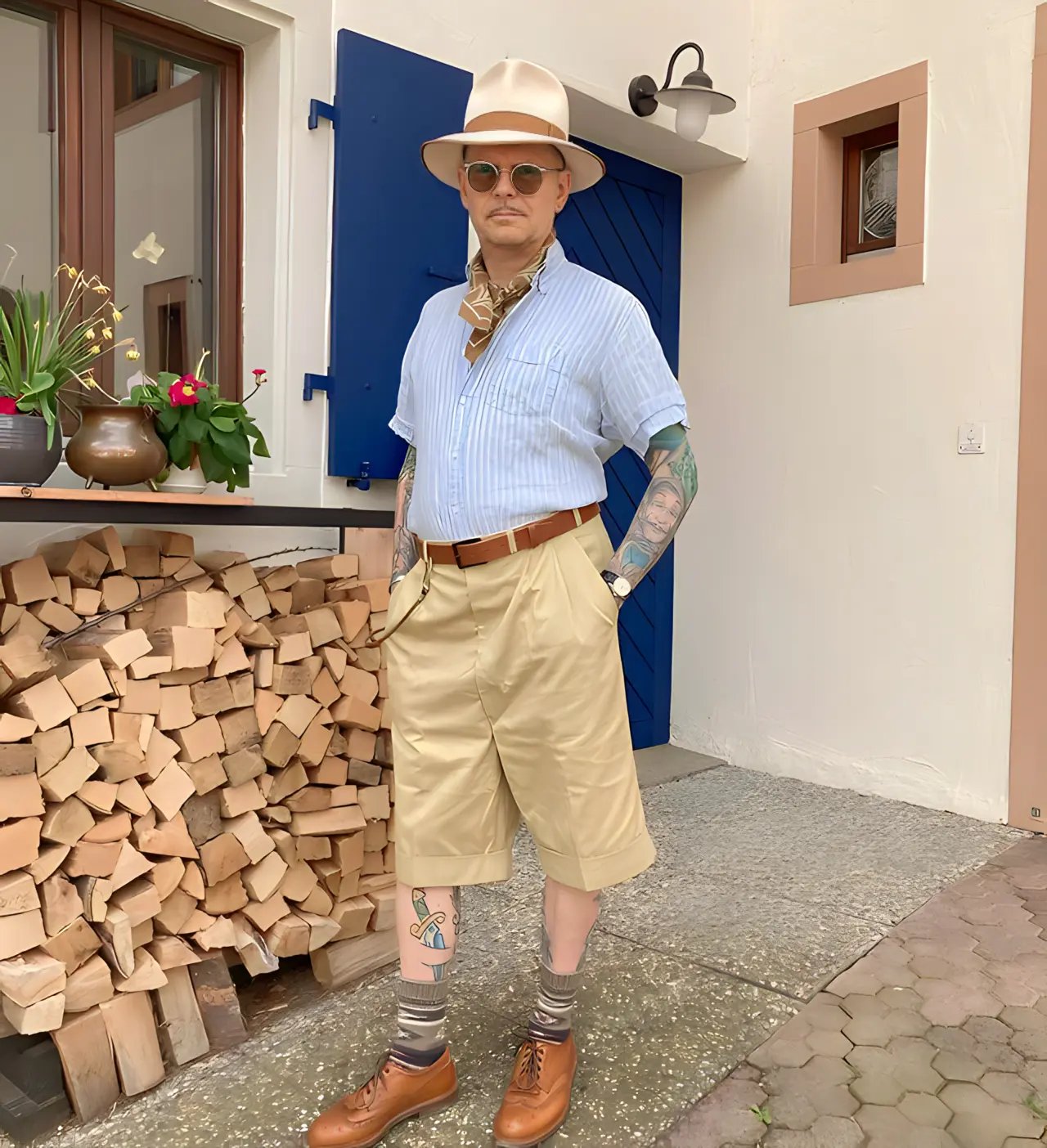 Tattooed gentleman in a classic fedora look by Agnoulita Hats