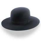Black fedora hat with a wide brim on a white background