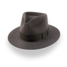 Caribou Grey outback fedora in rabbit fur felt with teardrop crown and dark brown grosgrain ribbon, three-quarter view