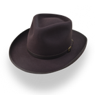 Brown fedora hat with a belt on a white background