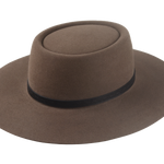 The Pioneer: Side angle highlighting the dark taupe felt and contrasting black leather hat belt | Agnoulita Hats