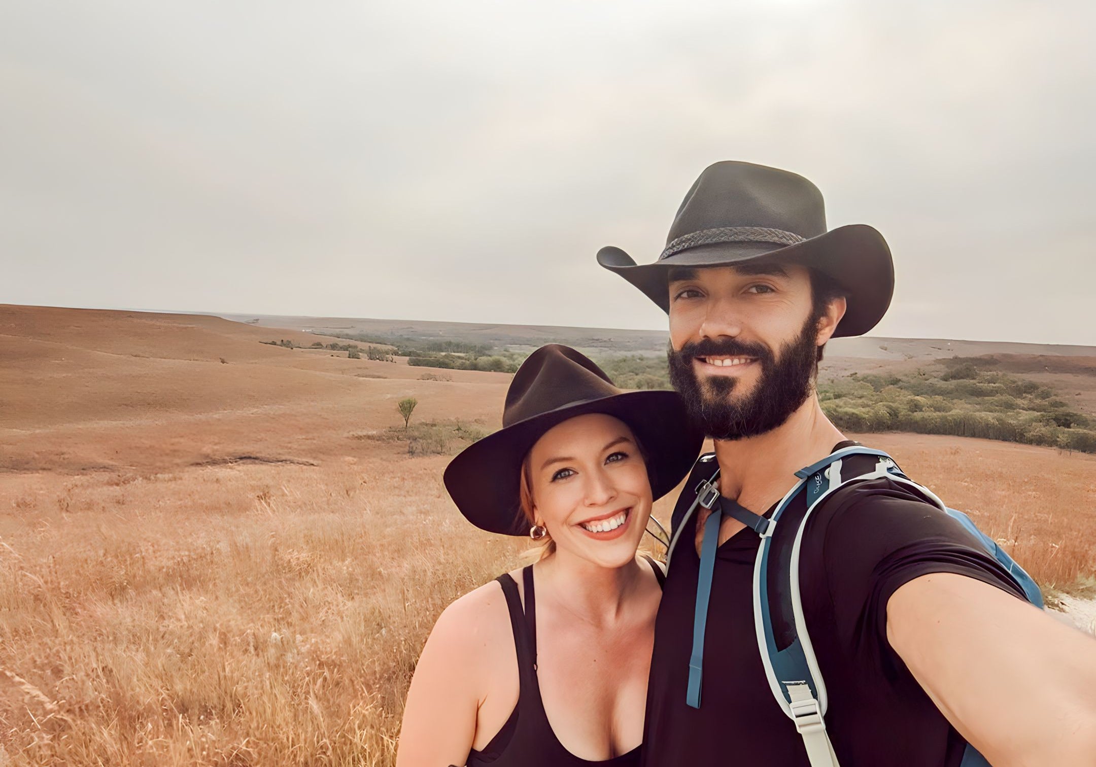 Selfie of a joyful couple celebrating the Great Outdoors, both wearing their Agnoulita Hats.