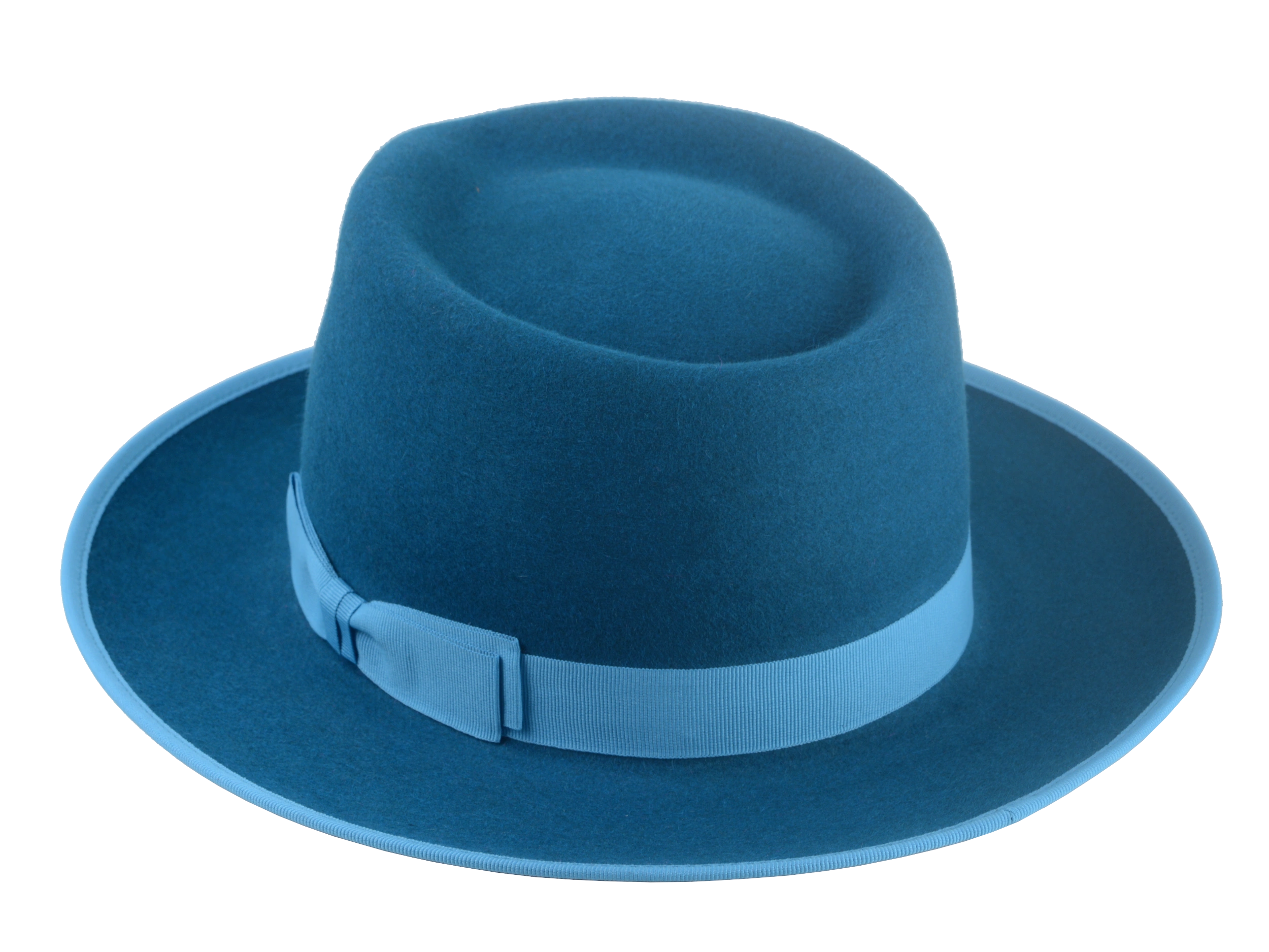 Close-up of Equinox dark teal fedora hat with sky grosgrain ribbon band and bow