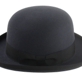 Side profile of the Jubilee bowler hat highlighting the 1 1/2" grosgrain ribbon hatband and the neatly rolled brim.
